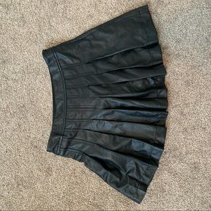 Black leather pleated skirt